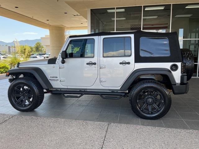 used 2010 Jeep Wrangler Unlimited car, priced at $10,986