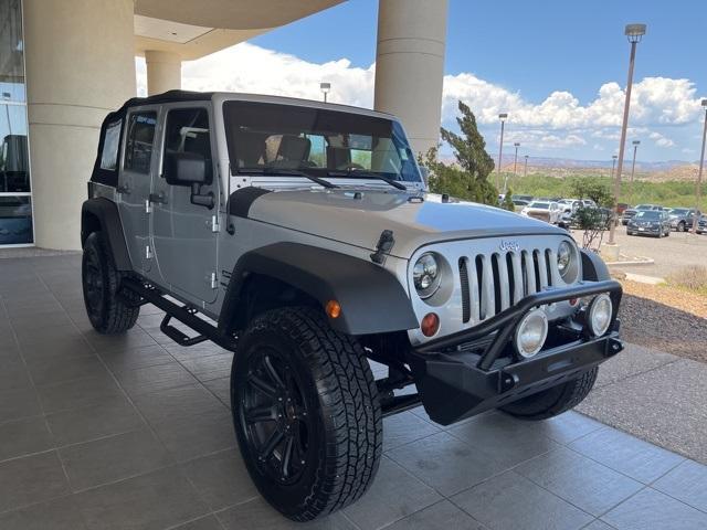 used 2010 Jeep Wrangler Unlimited car, priced at $10,986