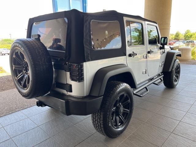 used 2010 Jeep Wrangler Unlimited car, priced at $10,986