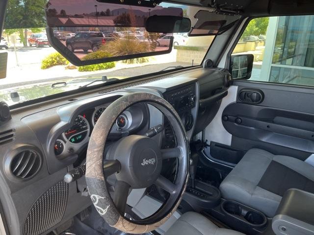 used 2010 Jeep Wrangler Unlimited car, priced at $10,986