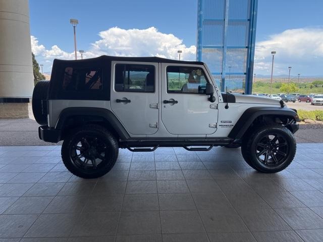 used 2010 Jeep Wrangler Unlimited car, priced at $10,986