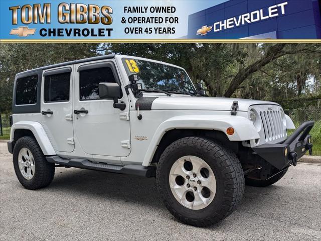 used 2013 Jeep Wrangler Unlimited car, priced at $19,214