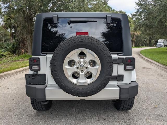 used 2013 Jeep Wrangler Unlimited car, priced at $16,995