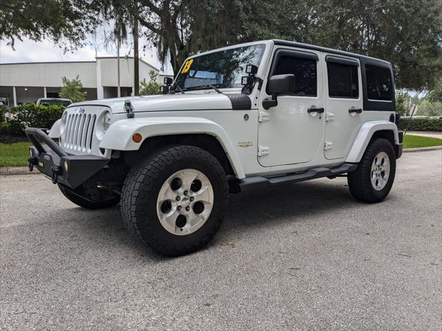 used 2013 Jeep Wrangler Unlimited car, priced at $16,995