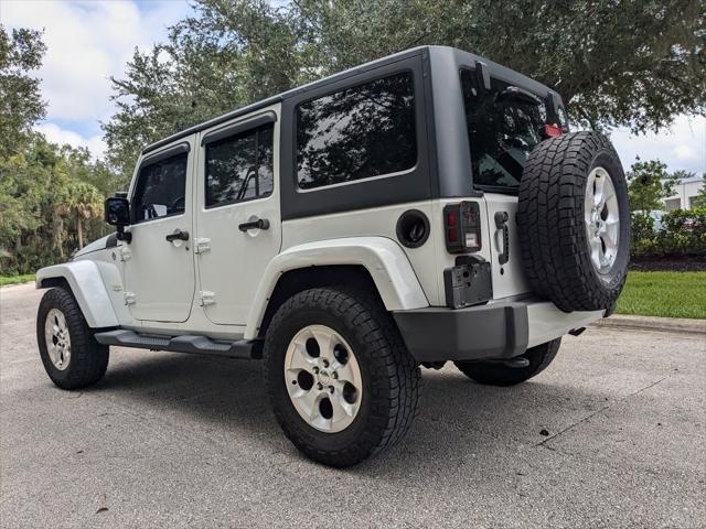 used 2013 Jeep Wrangler Unlimited car, priced at $16,995