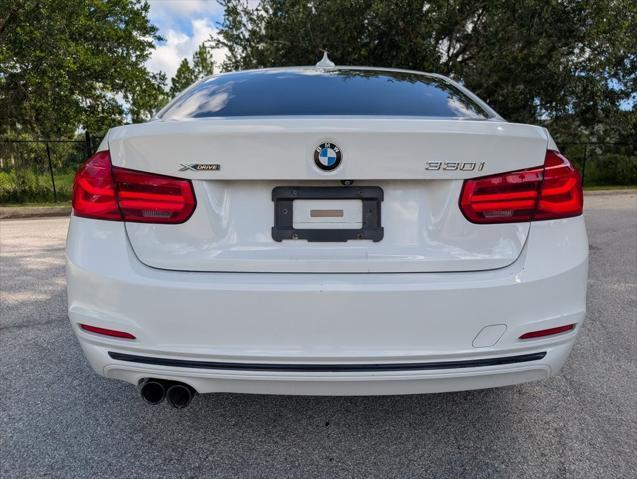 used 2018 BMW 330 car, priced at $19,295