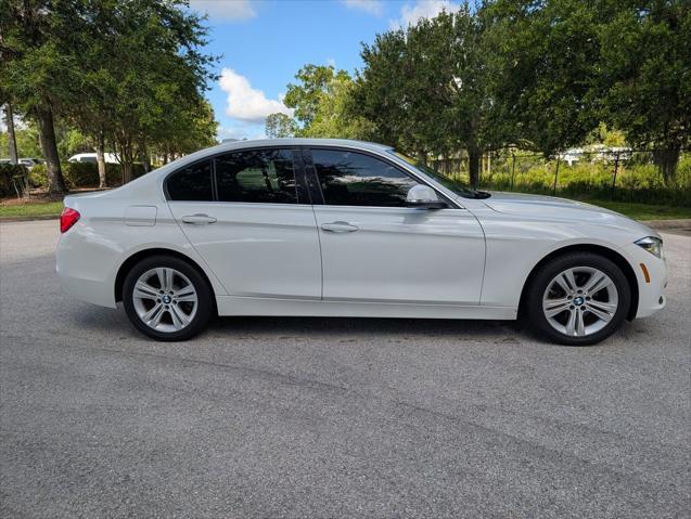 used 2018 BMW 330 car, priced at $19,295