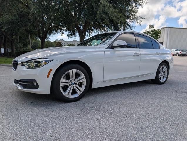 used 2018 BMW 330 car, priced at $19,295