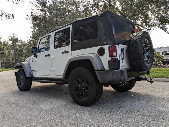 used 2016 Jeep Wrangler Unlimited car, priced at $21,436