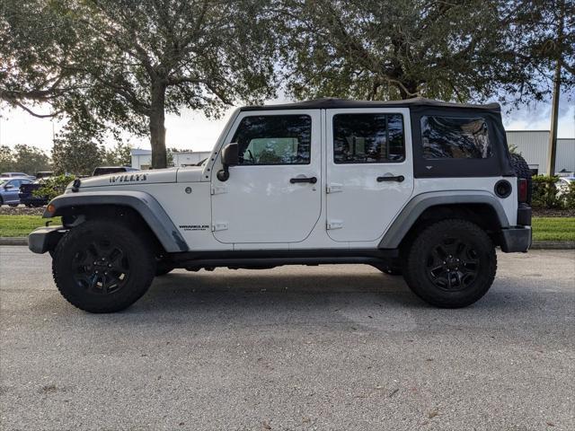 used 2016 Jeep Wrangler Unlimited car, priced at $21,436