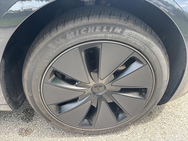 used 2025 Tesla Model 3 car, priced at $36,995