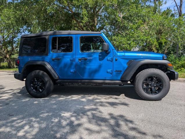 used 2021 Jeep Wrangler Unlimited car, priced at $30,495