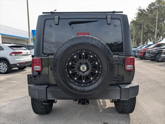 used 2015 Jeep Wrangler Unlimited car, priced at $18,995