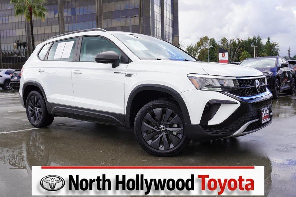 used 2023 Volkswagen Taos car, priced at $18,000
