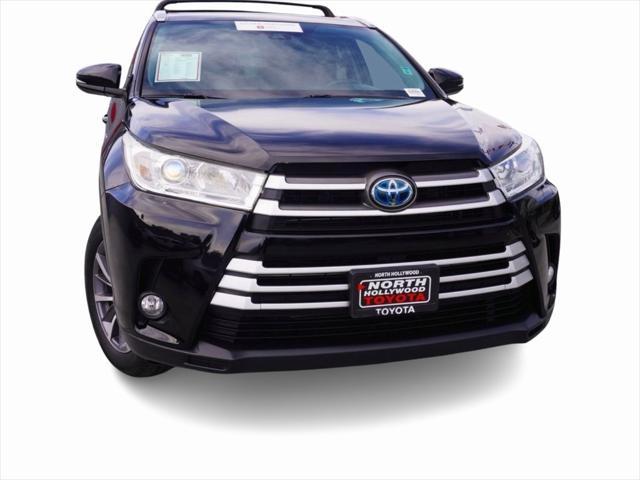 used 2019 Toyota Highlander Hybrid car, priced at $27,299