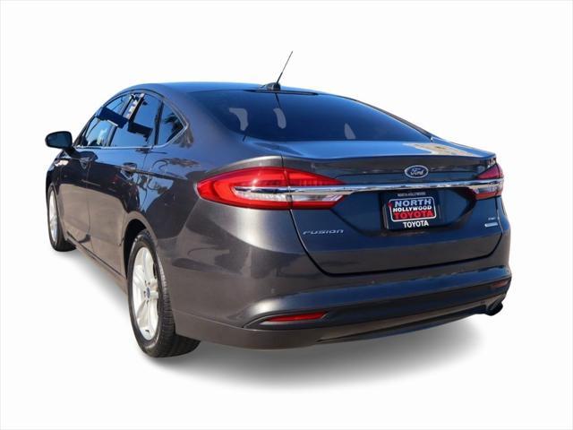 used 2018 Ford Fusion car, priced at $10,989