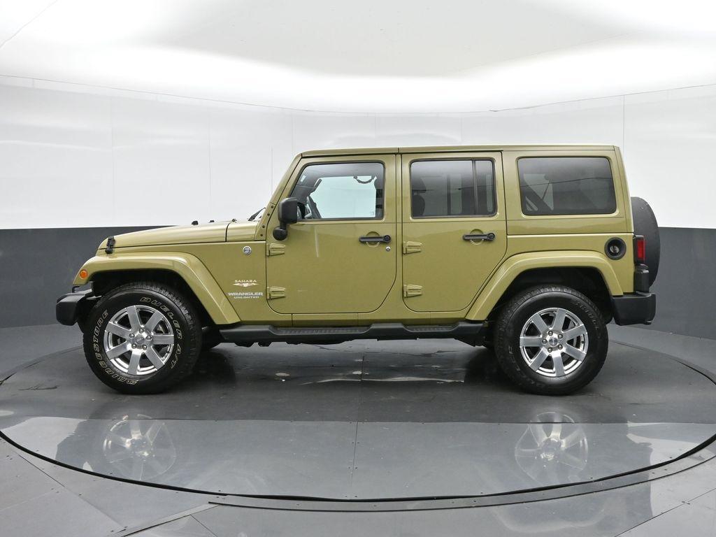 used 2013 Jeep Wrangler Unlimited car, priced at $16,978