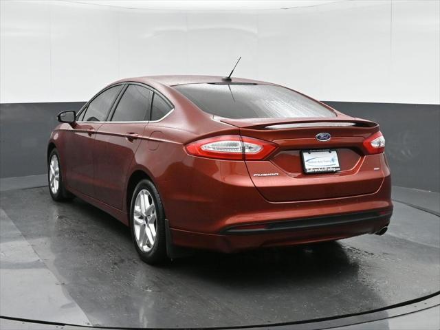 used 2014 Ford Fusion car, priced at $9,999
