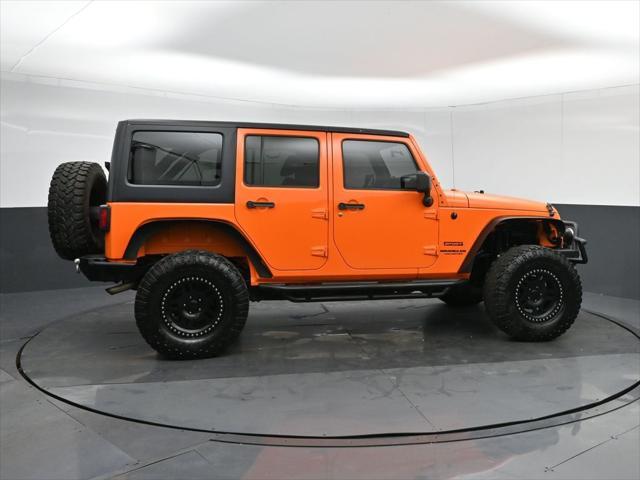 used 2012 Jeep Wrangler Unlimited car, priced at $17,999