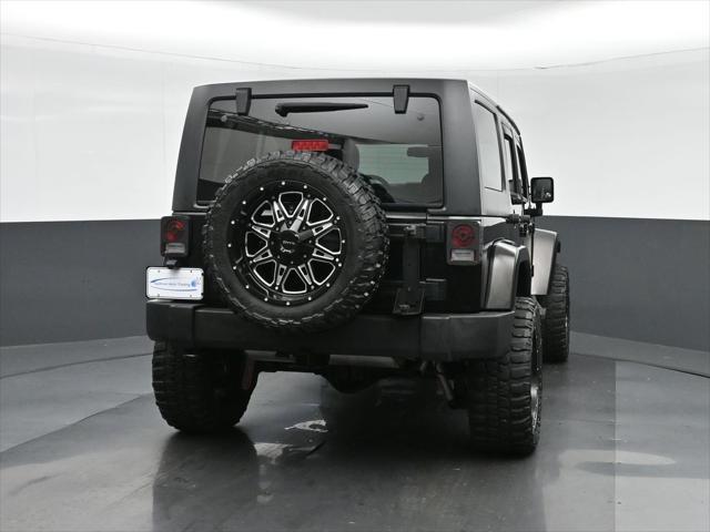 used 2015 Jeep Wrangler Unlimited car, priced at $27,599