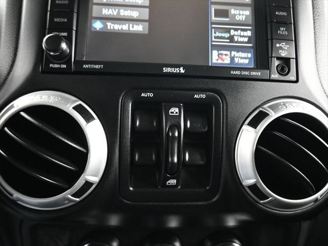 used 2015 Jeep Wrangler Unlimited car, priced at $27,599