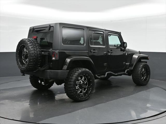 used 2015 Jeep Wrangler Unlimited car, priced at $27,599