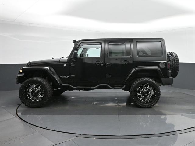used 2015 Jeep Wrangler Unlimited car, priced at $27,599
