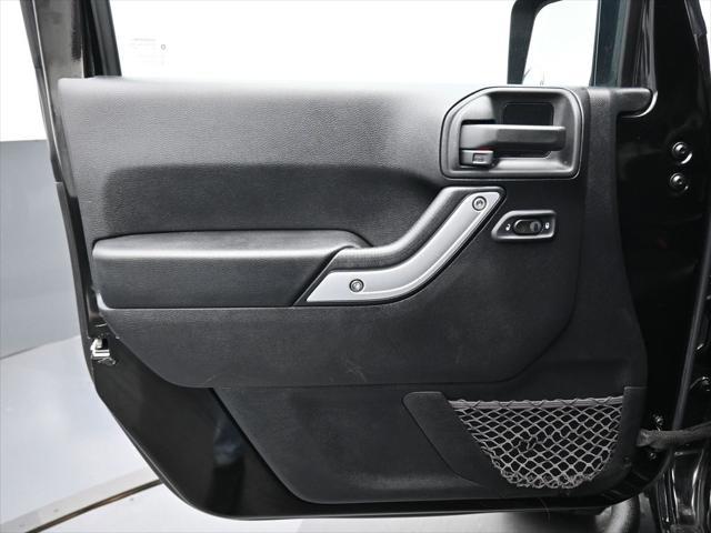 used 2015 Jeep Wrangler Unlimited car, priced at $27,599