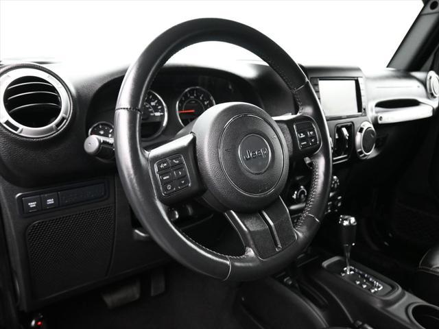 used 2015 Jeep Wrangler Unlimited car, priced at $27,599