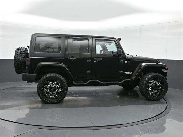 used 2015 Jeep Wrangler Unlimited car, priced at $27,599