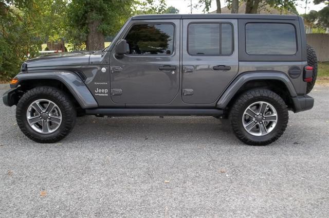 used 2018 Jeep Wrangler Unlimited car, priced at $33,980