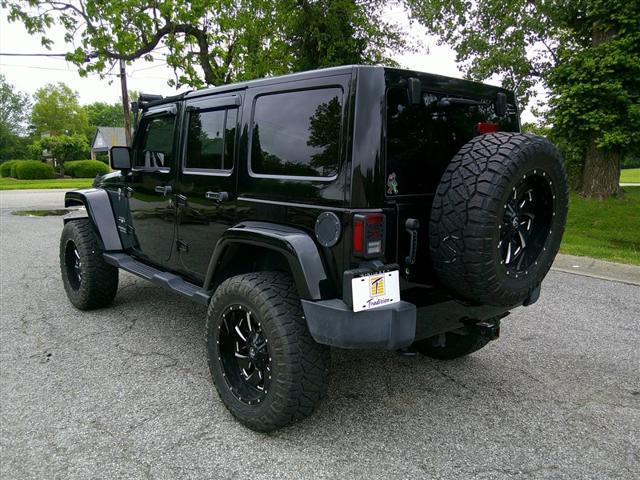 used 2016 Jeep Wrangler Unlimited car, priced at $27,980