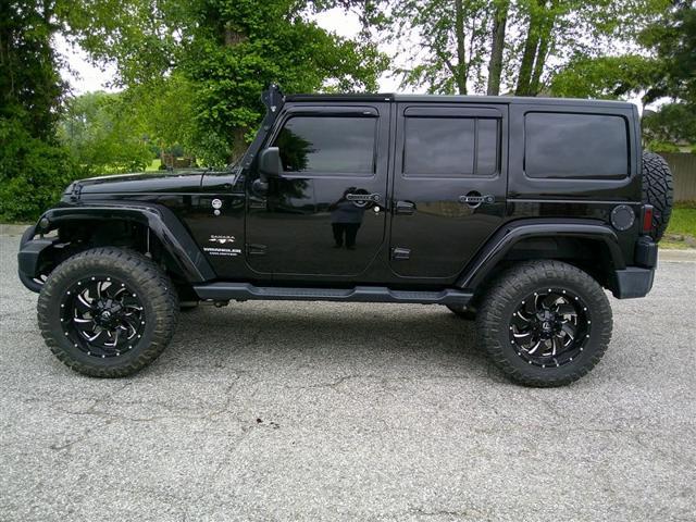 used 2016 Jeep Wrangler Unlimited car, priced at $27,980