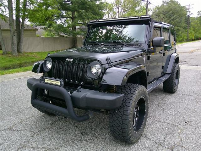 used 2016 Jeep Wrangler Unlimited car, priced at $27,980