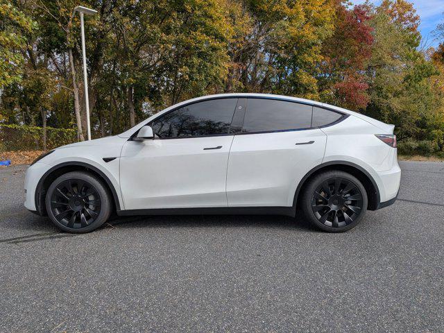 used 2025 Tesla Model Y car, priced at $41,497