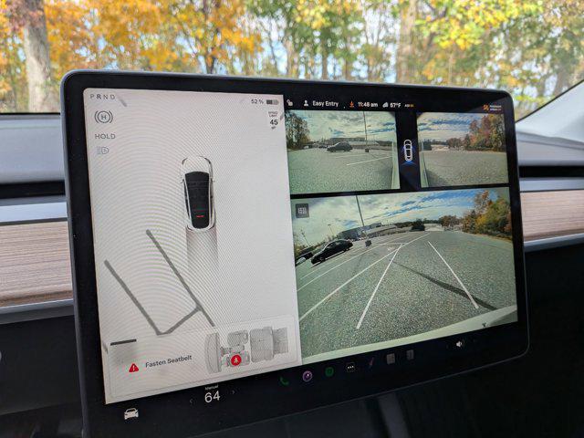 used 2025 Tesla Model Y car, priced at $41,497