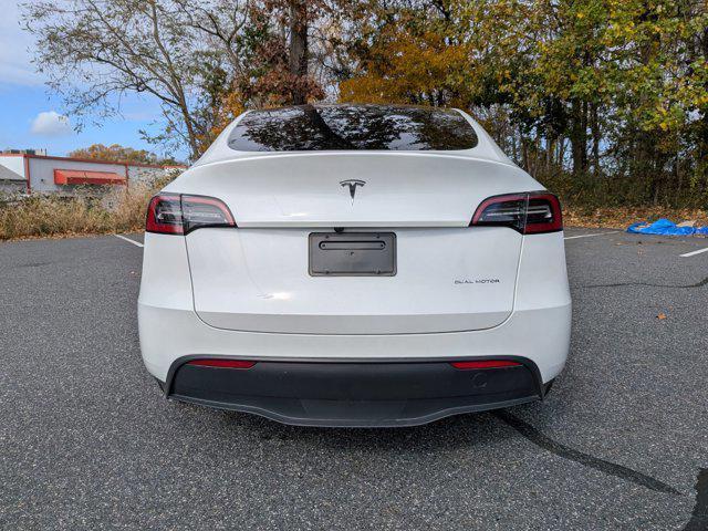 used 2025 Tesla Model Y car, priced at $41,497