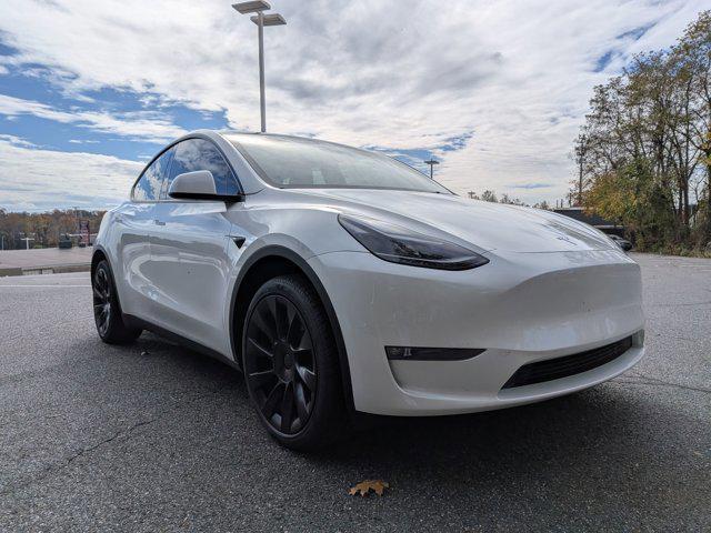 used 2025 Tesla Model Y car, priced at $41,497