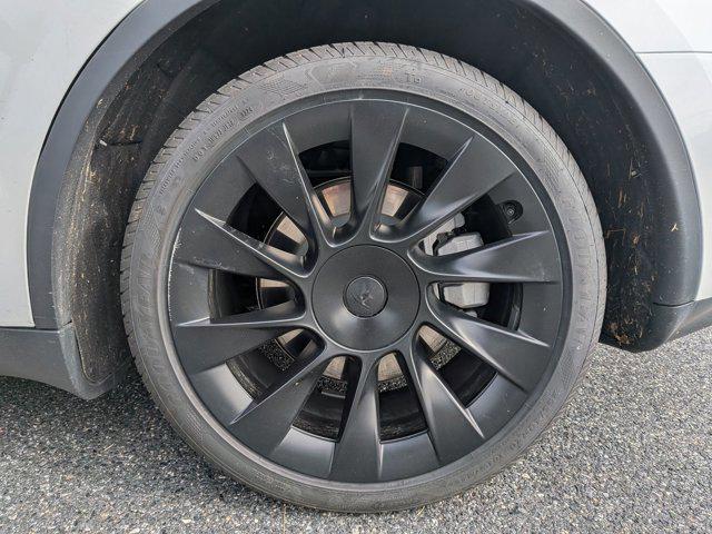 used 2025 Tesla Model Y car, priced at $41,497