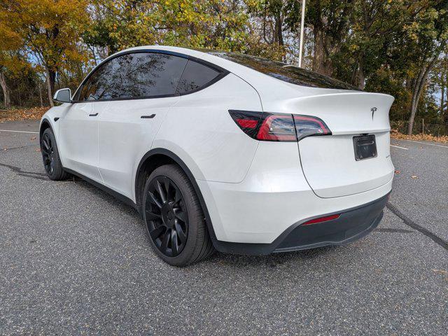used 2025 Tesla Model Y car, priced at $41,497