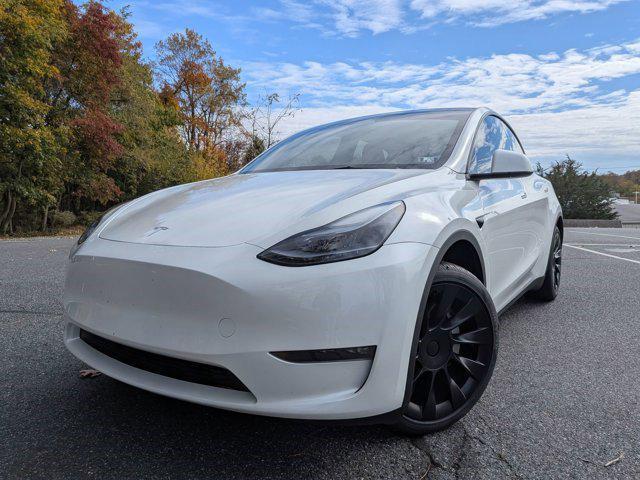 used 2025 Tesla Model Y car, priced at $41,497