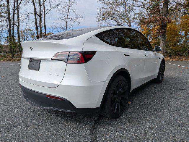 used 2025 Tesla Model Y car, priced at $41,497