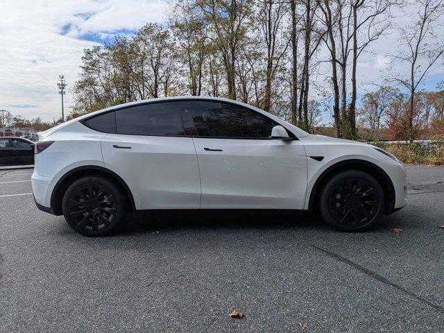 used 2025 Tesla Model Y car, priced at $41,497