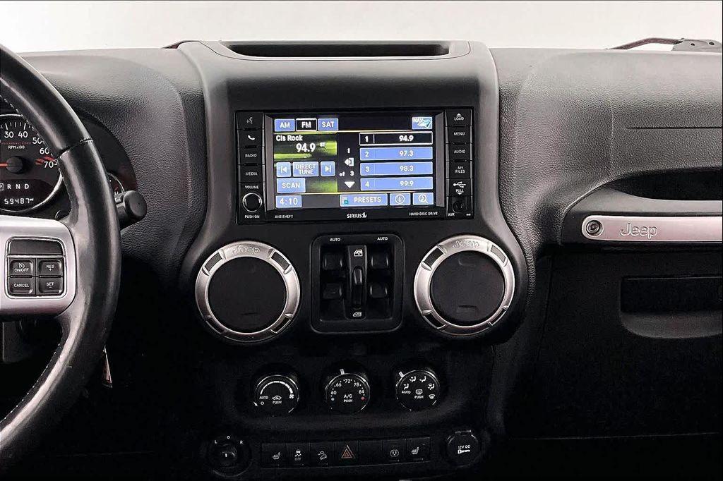 used 2015 Jeep Wrangler Unlimited car, priced at $25,848