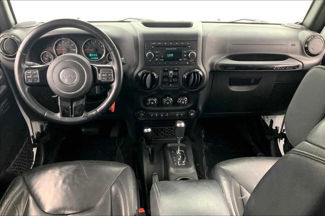used 2015 Jeep Wrangler Unlimited car, priced at $21,219