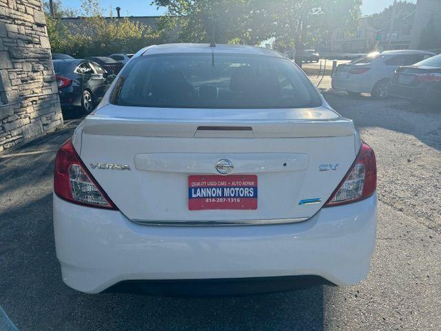 used 2015 Nissan Versa car, priced at $6,500