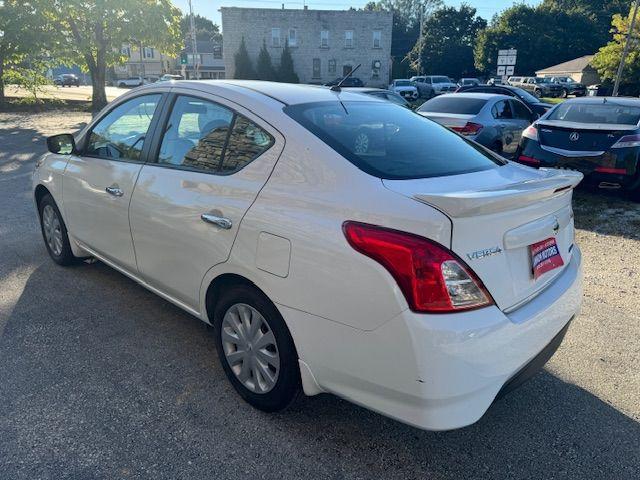 used 2015 Nissan Versa car, priced at $6,500