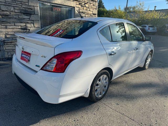 used 2015 Nissan Versa car, priced at $6,500