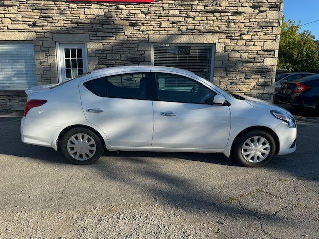 used 2015 Nissan Versa car, priced at $6,500