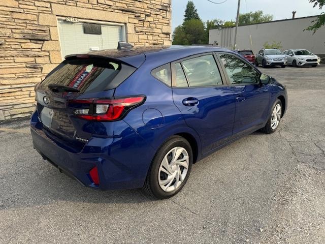 used 2024 Subaru Impreza car, priced at $17,500